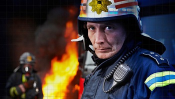 Firefighter-with-digital-handheld-walkie-talkie-radio.jpg